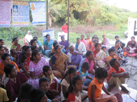 Attendees listening to the lecture